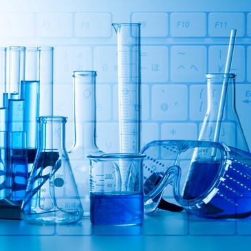 Laboratory glassware with blue liquid